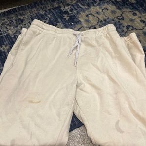 Yellow sweatpants. Some small stains but not to noticeable when wearing them.